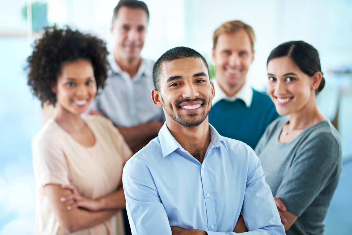 5 smiling office workers